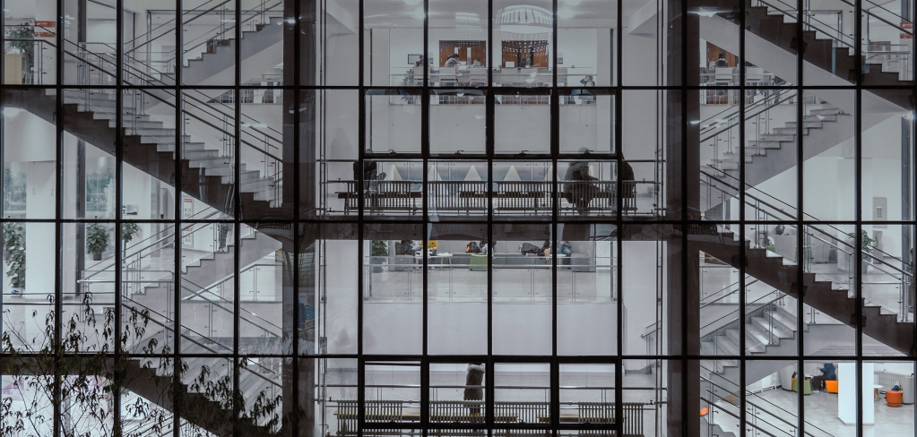 Outside view into windows of an office building staircase