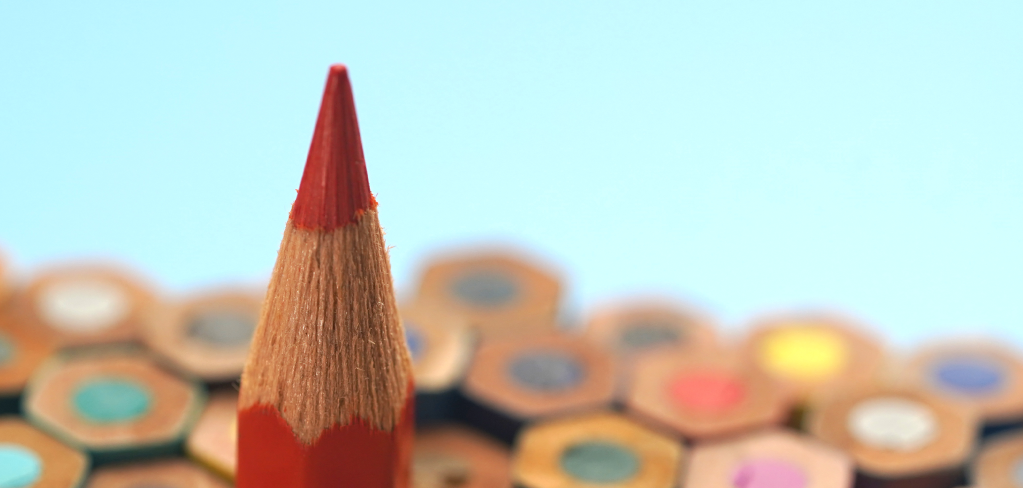 A set of colored pencils suggests the diversification possible with ETFs.